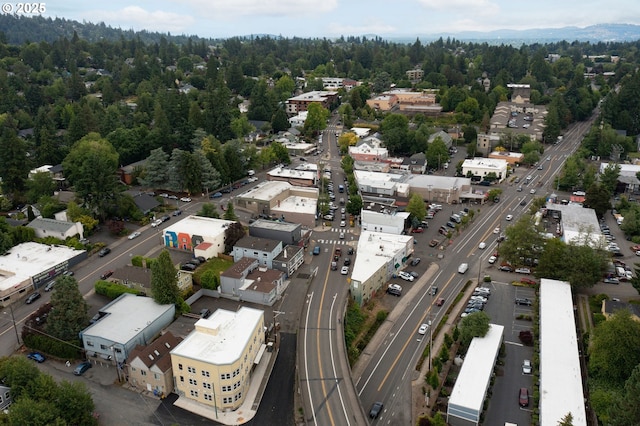 3925 SW Multnomah Blvd Unit 204, Portland, OR 97219 - aerial overview of property's location featuring a highway and a heavily wooded area