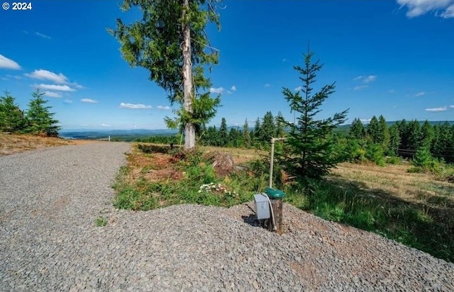 exterior space with a rural view