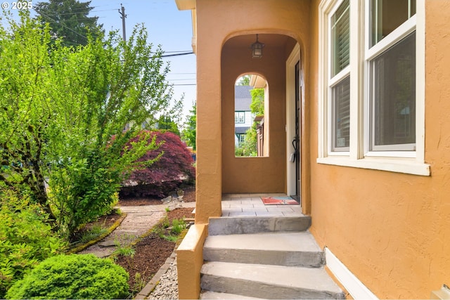 3305 NE Siskiyou St, Portland, OR 97212 - doorway to property featuring stucco siding