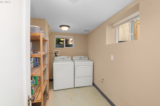 3305 NE Siskiyou St, Portland, OR 97212 - laundry area with independent washer and dryer and baseboards