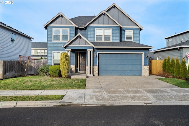 craftsman-style house with a front lawn and a garage