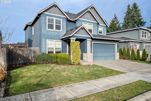 view of front of home with a garage and a front yard