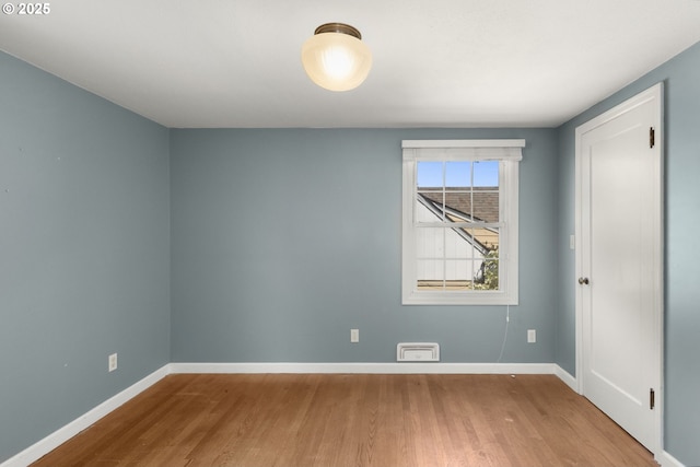 205 NE Billingher Dr, Portland, OR 97220 - empty room with wood finished floors and baseboards