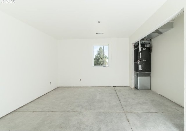 305 N Main St, Halfway, OR 97834 - spare room featuring concrete flooring and heating unit
