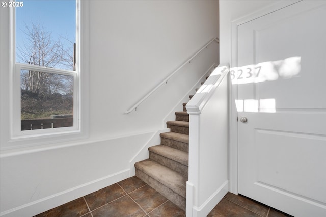 staircase featuring a healthy amount of sunlight