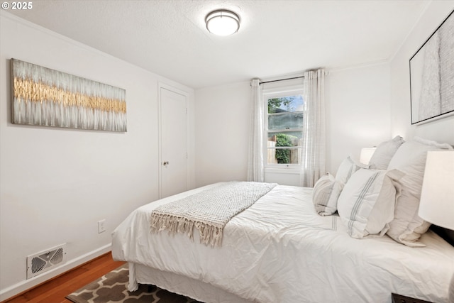 10914 SW 64th Ave, Portland, OR 97219 - bedroom featuring wood finished floors and baseboards