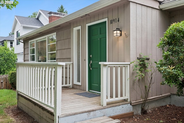 10914 SW 64th Ave, Portland, OR 97219 - entrance to property featuring a chimney and a deck
