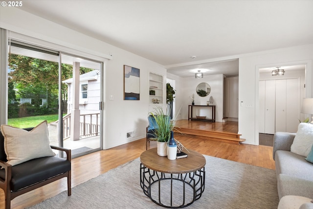 10914 SW 64th Ave, Portland, OR 97219 - living room featuring light wood finished floors and built in shelves