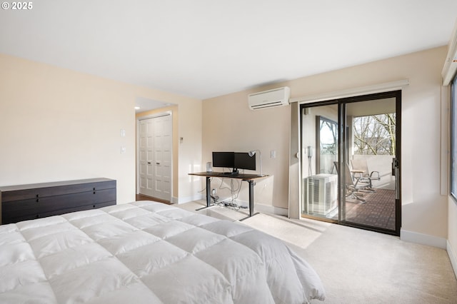 carpeted bedroom featuring access to exterior, a closet, baseboards, and a wall unit AC