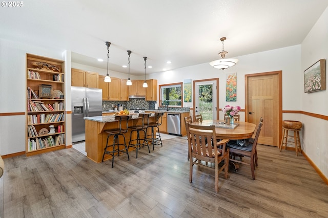 66020 Meissner Rd, Deer Island, OR 97054 - dining area with light wood-style flooring, baseboards, and recessed lighting