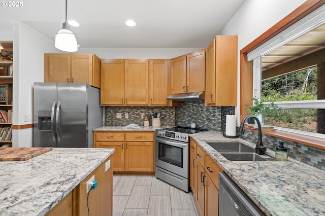 66020 Meissner Rd, Deer Island, OR 97054 - kitchen with stainless steel appliances, a sink, under cabinet range hood, backsplash, and light stone counters