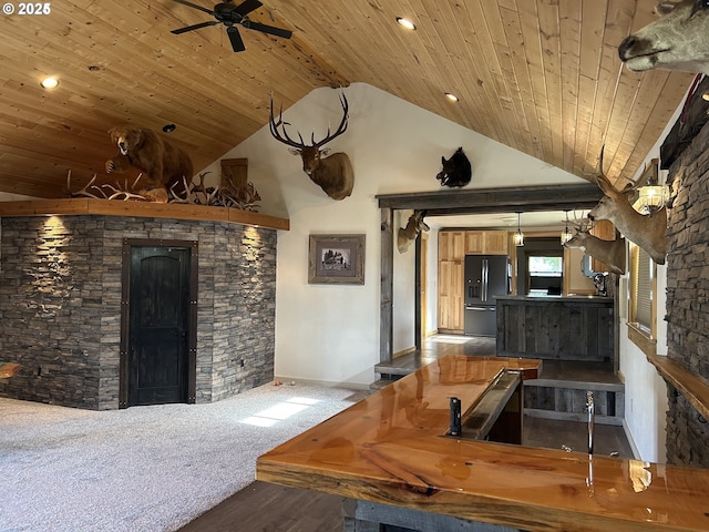 living room featuring wooden ceiling, a ceiling fan, wood finished floors, high vaulted ceiling, and baseboards