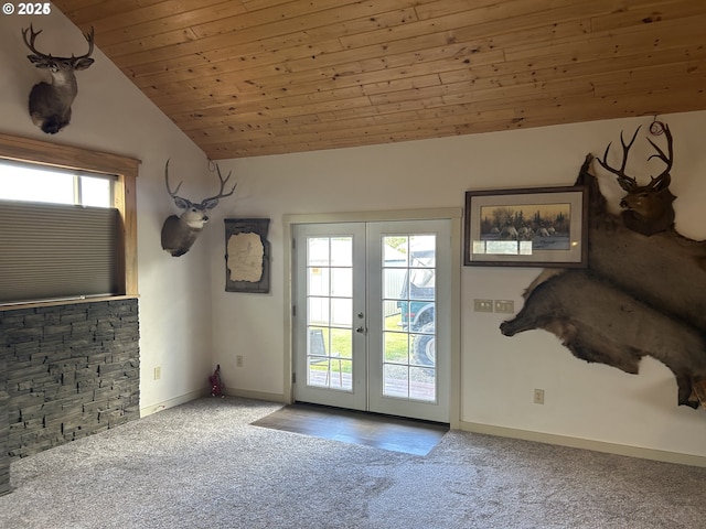 doorway to outside featuring carpet floors, vaulted ceiling, french doors, wooden ceiling, and baseboards