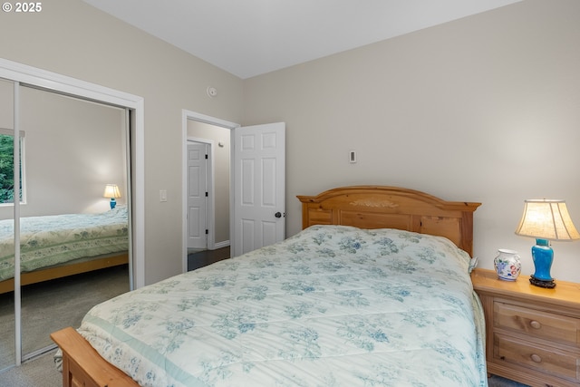 carpeted bedroom with a closet