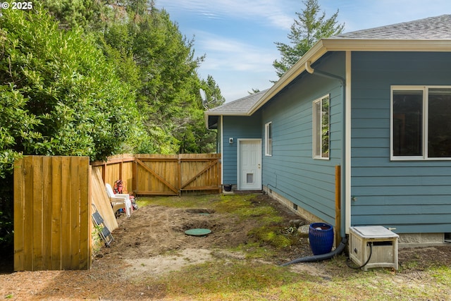 view of yard with a gate and fence