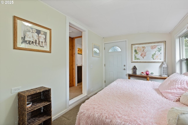 bedroom featuring carpet flooring and baseboards