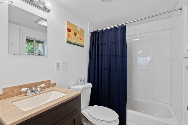full bath with shower / bath combo, toilet, and vanity