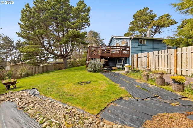 view of yard with a deck and fence private yard
