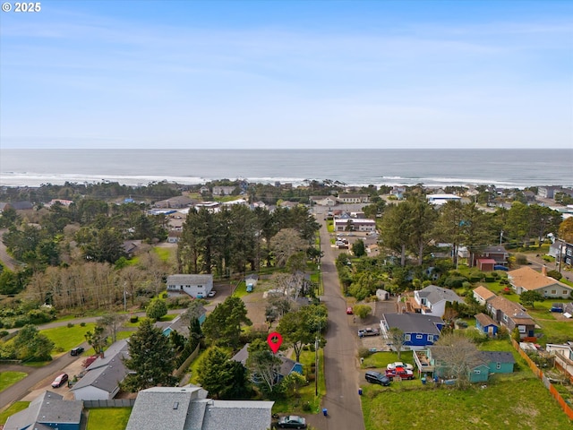 aerial view featuring a water view and a residential view