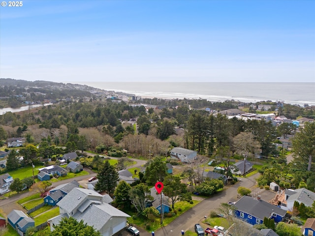 aerial view with a residential view and a water view