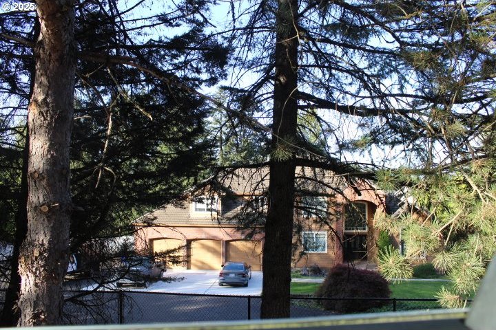 view of side of property with fence