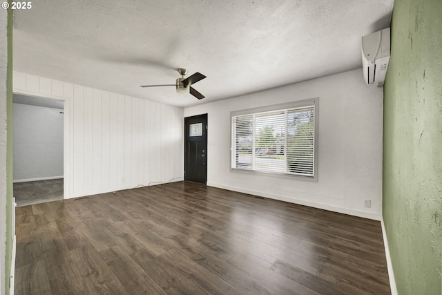 1332 Centennial Blvd, Springfield, OR 97477 - spare room with dark wood finished floors, ceiling fan, and a textured ceiling