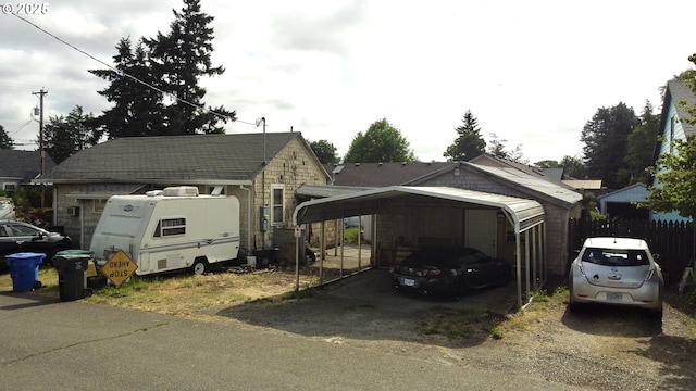 6800 SE Duke St, Portland, OR 97206 - view of front of home featuring a carport and driveway