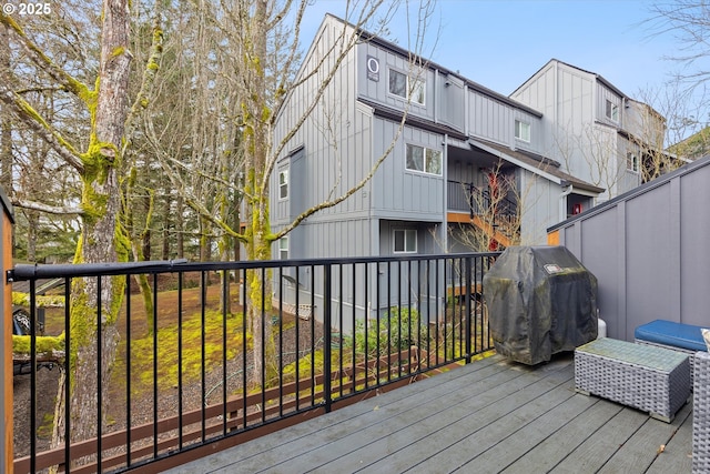 wooden deck with grilling area