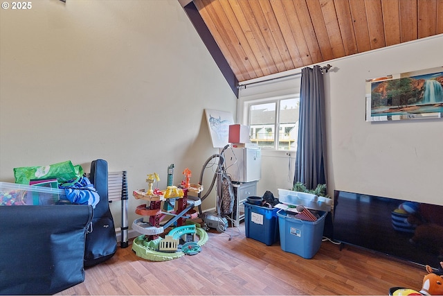 rec room with wood ceiling, wood-type flooring, and vaulted ceiling