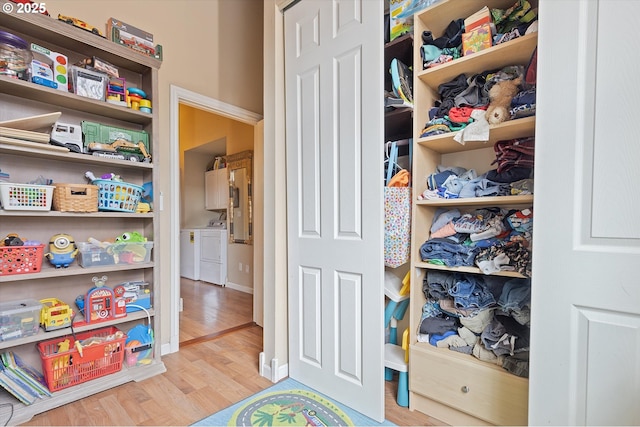 closet featuring independent washer and dryer