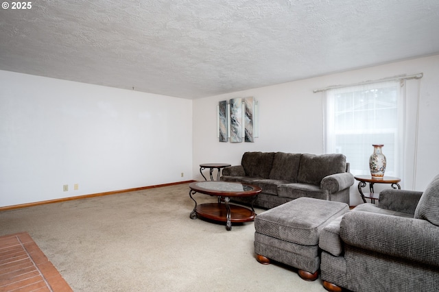 carpeted living room featuring a textured ceiling and baseboards