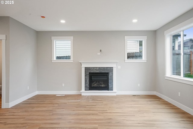 195 Iowa St, Silverton, OR 97381 - unfurnished living room featuring recessed lighting, baseboards, and light wood-type flooring
