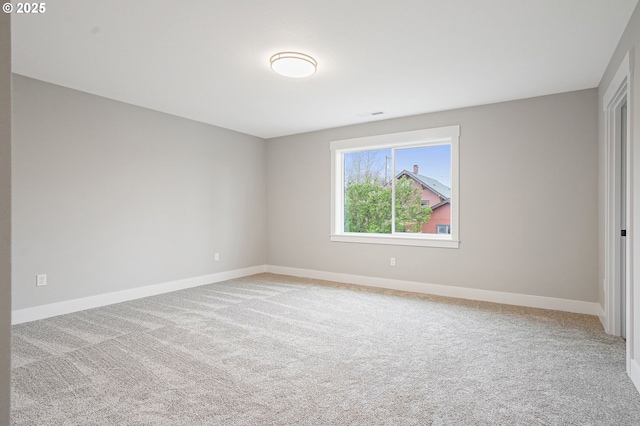 195 Iowa St, Silverton, OR 97381 - spare room featuring carpet floors, baseboards, and visible vents
