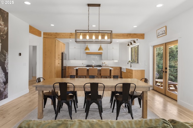 25053 Larson Rd, Monroe, OR 97456 - dining area featuring light wood-type flooring, recessed lighting, and bar with sink