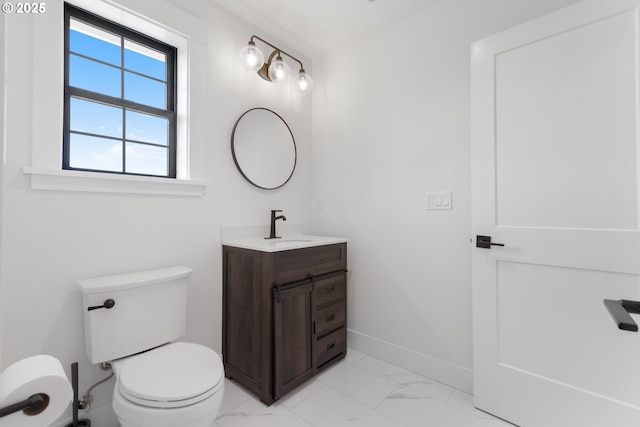 25053 Larson Rd, Monroe, OR 97456 - half bathroom featuring vanity and marble finish flooring