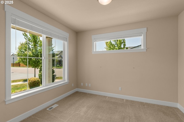 1803 35th Ave, Forest Grove, OR 97116 - spare room featuring baseboards and light carpet