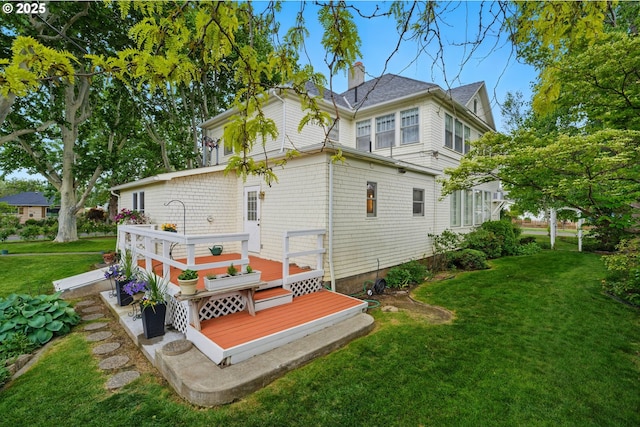 113 NE 7th Ave, Milton-Freewater, OR 97862 - rear view of house with a wooden deck, a yard, and a chimney