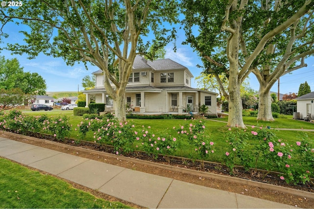 113 NE 7th Ave, Milton-Freewater, OR 97862 - victorian home featuring covered porch and a front yard
