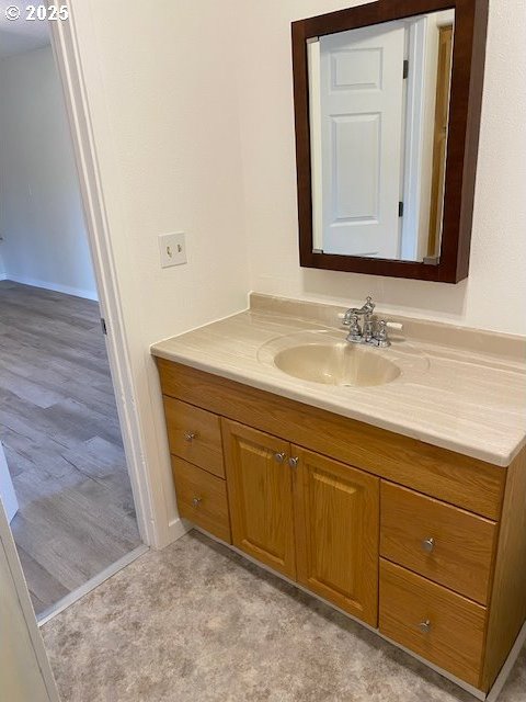 82277 Davisson Rd, Creswell, OR 97426 - bathroom featuring vanity and baseboards
