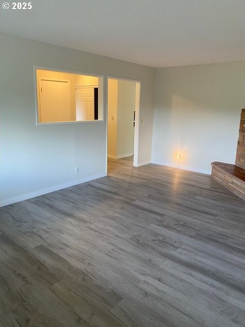 82277 Davisson Rd, Creswell, OR 97426 - empty room featuring wood finished floors and baseboards