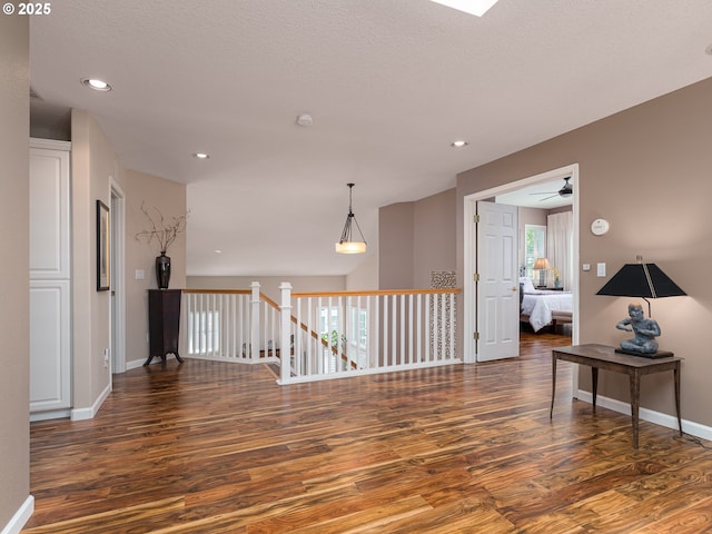 8833 SE Bristol Park Dr, Happy Valley, OR 97086 - empty room with wood finished floors, ceiling fan, and recessed lighting