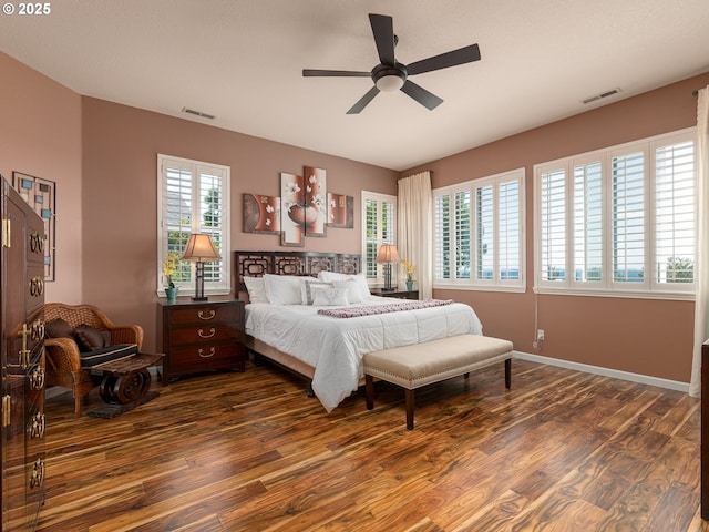 8833 SE Bristol Park Dr, Happy Valley, OR 97086 - bedroom with dark wood-style flooring and a ceiling fan