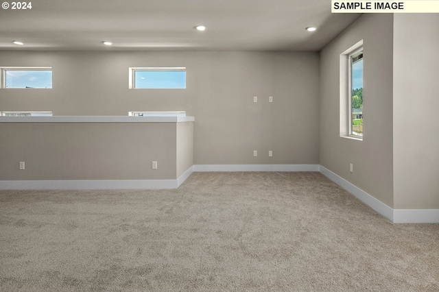 12343 SE Falling Rain Way, Happy Valley, OR 97086 - carpeted empty room with baseboards and recessed lighting