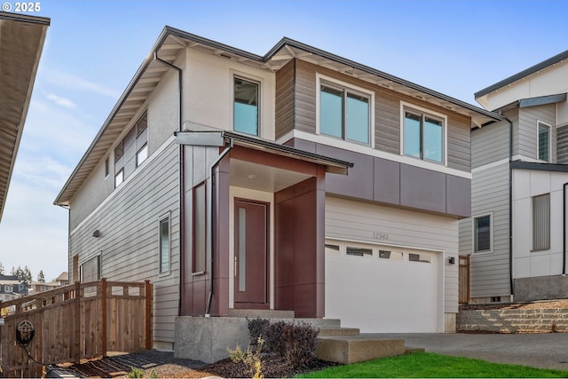 12343 SE Falling Rain Way, Happy Valley, OR 97086 - view of front of home with an attached garage and driveway