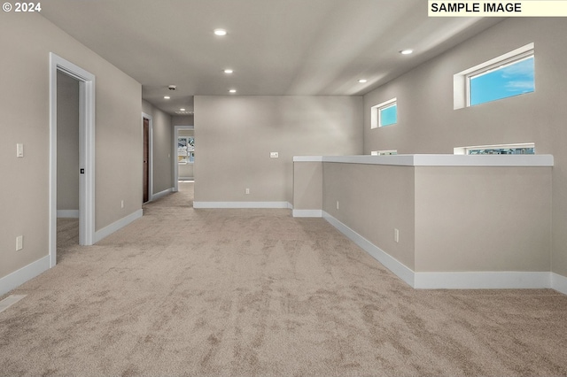 12343 SE Falling Rain Way, Happy Valley, OR 97086 - unfurnished room featuring carpet flooring, recessed lighting, and healthy amount of natural light