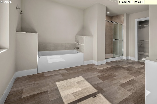 12343 SE Falling Rain Way, Happy Valley, OR 97086 - full bathroom with a stall shower, a bath, a spacious closet, and recessed lighting