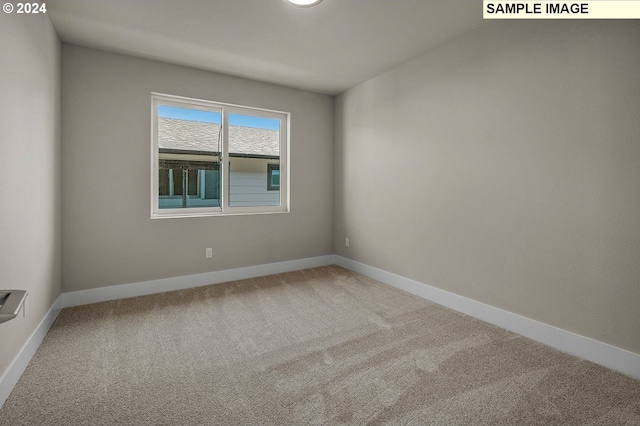12343 SE Falling Rain Way, Happy Valley, OR 97086 - empty room featuring carpet flooring and baseboards