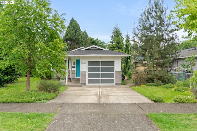 10258 N Allegheny Ave, Portland, OR 97203 - view of front facade featuring concrete driveway and a garage