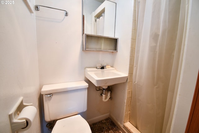 151 NW Sherry St, Winston, OR 97496 - bathroom with sink, a shower with shower curtain, and toilet
