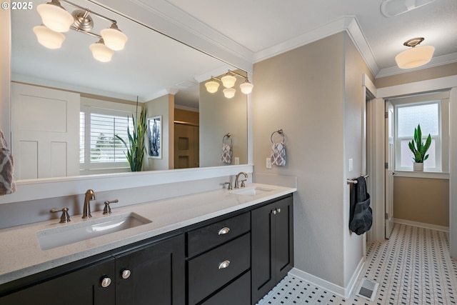 full bathroom featuring crown molding, a sink, and a healthy amount of sunlight